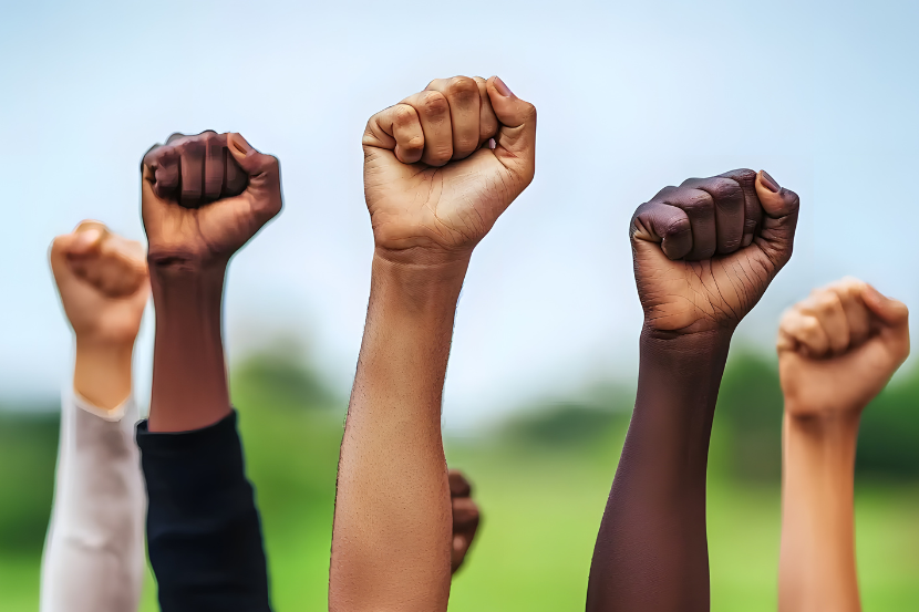 mãos em símbolo de resistência sobre o dia internacional do estudante