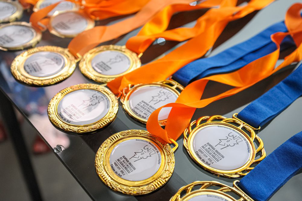 Quais são as escolas com mais medalhistas na OBMEP?